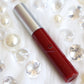 Red Pumps is a ruby red hydrating gloss. This gloss is also vegan, gluten-free, high shine, smooth and long lasting. It's made with premium rich ingredients to keep your lips soft, moisturized and luscious without feeling sticky. Red Pumps is available in a squeeze tube and a wand tube (doe foot applicator) for a more precise application.