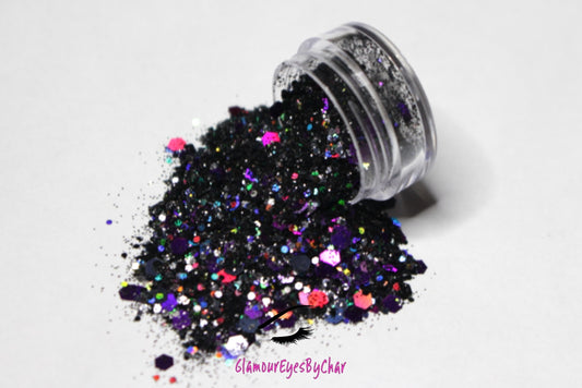 This glitter is called Potion and is part of the super chunky glitter collection.  It consists of black and purple glitter with a holographic sparkle. Potion can be used for your face, body, hair and nails.  Comes in 5g jars only. **Glitter will be discontinued once sold out**