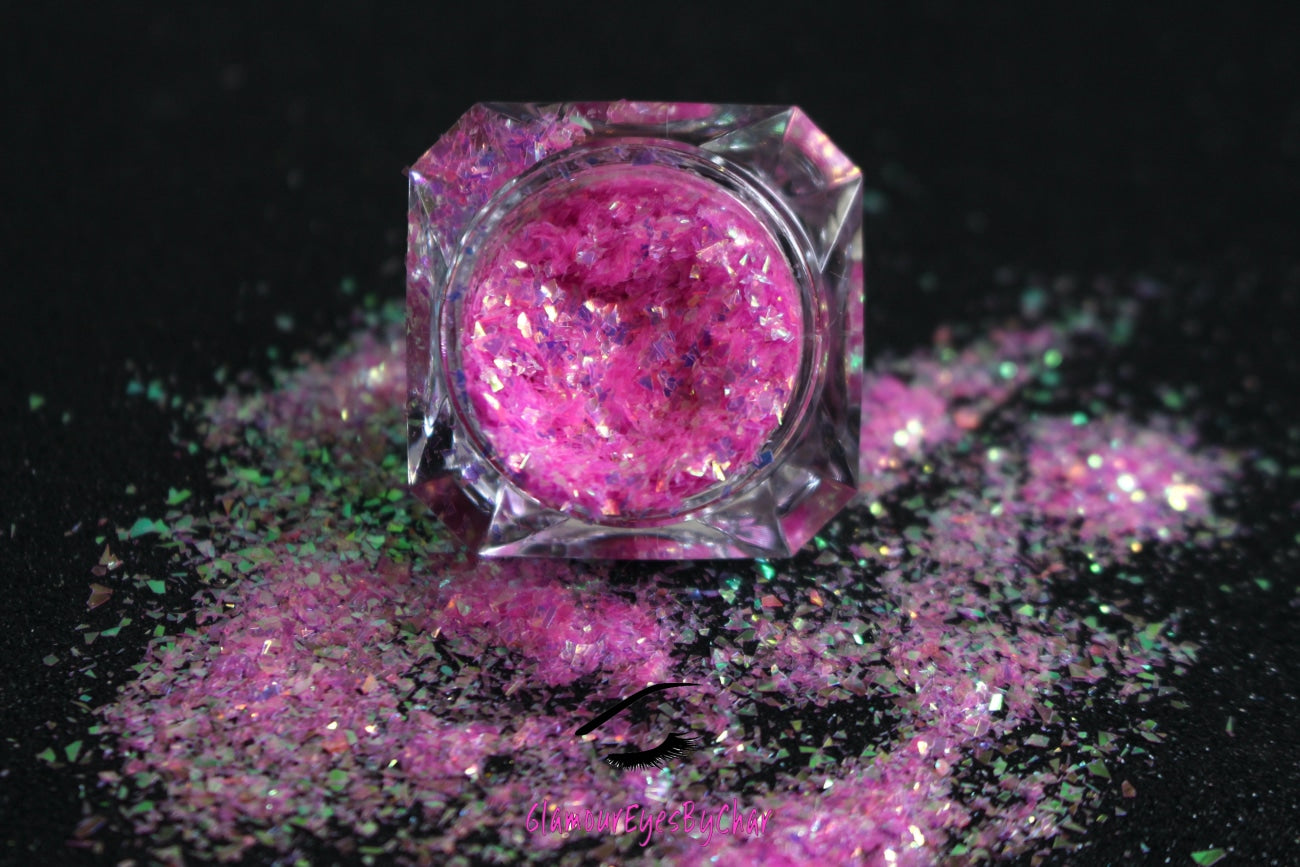 Princess Pink – Premium Bright Iridescent Rose Pink Cellophane Glitter Flakes
Part of our Cellophane Glitter Flakes Collection, these bright iridescent rose pink glitter shards shimmer with green and golden reflects. Princess Pink is perfect for nail art and glitter slime.
Available in 5g jars only.