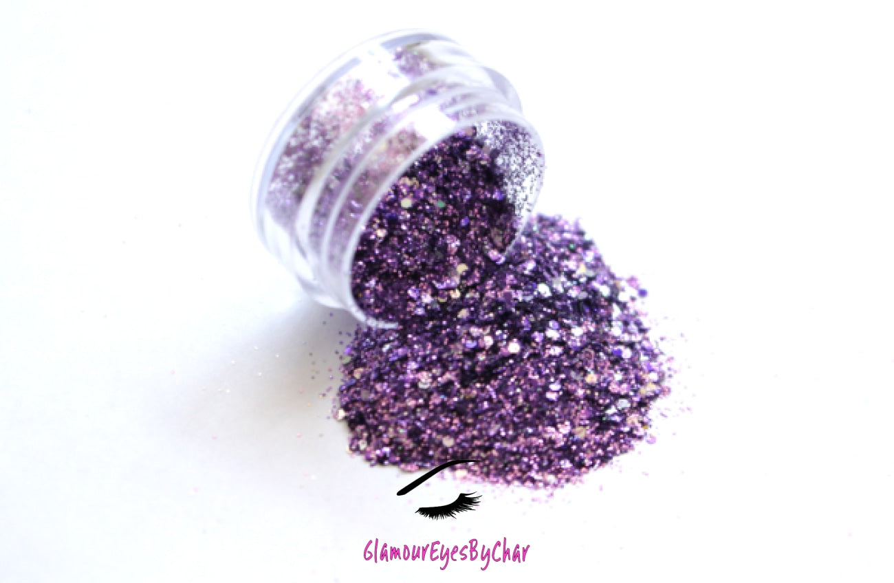 This glitter is called Purple Rain and is part of the chunky glitter collection. It consists of light purple glitter with a silver holographic sparkle. Purple Rain can be used for your face, body, hair and nails. Comes in 5g jars only.
