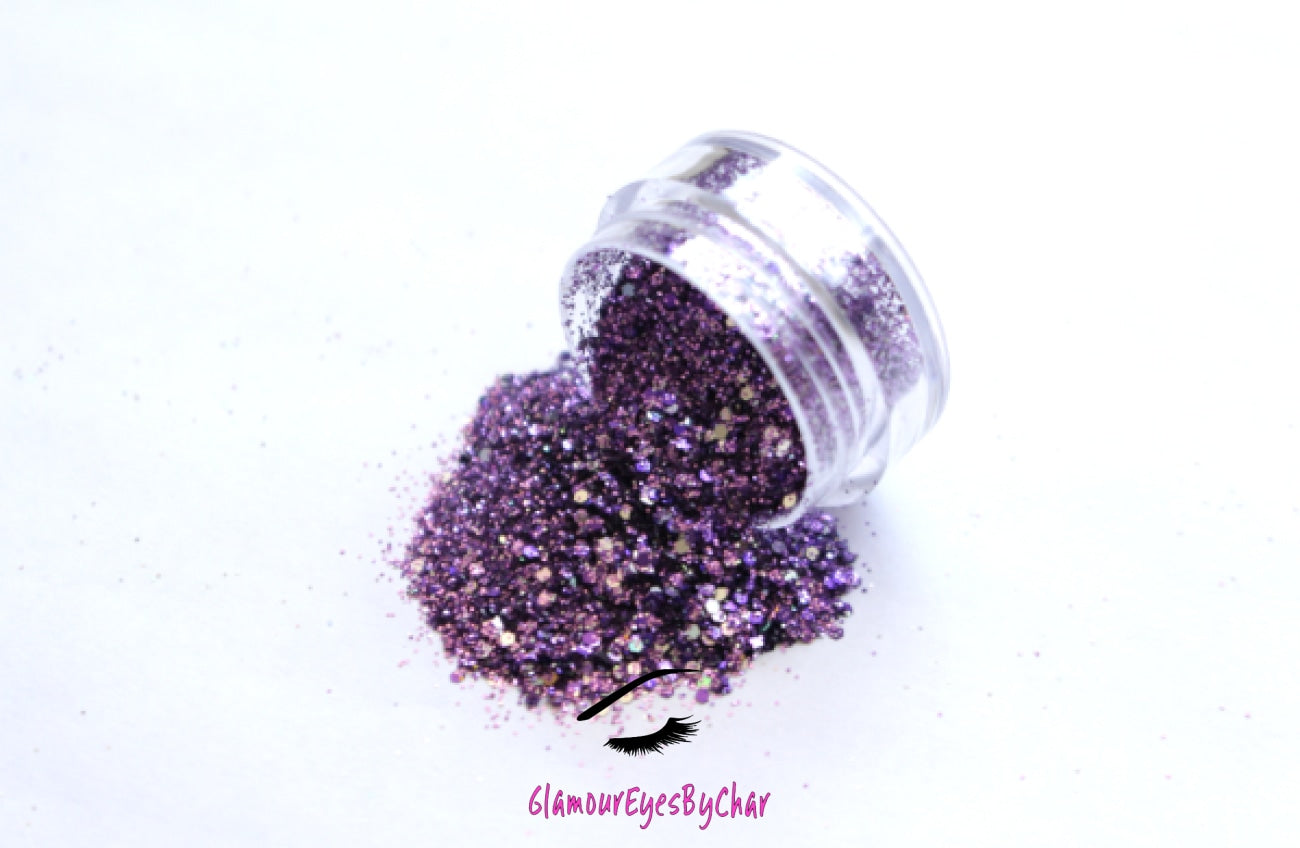 This glitter is called Purple Rain and is part of the chunky glitter collection.  It consists of light purple glitter with a silver holographic sparkle. Purple Rain can be used for your face, body, hair and nails.  Comes in 5g jars only.