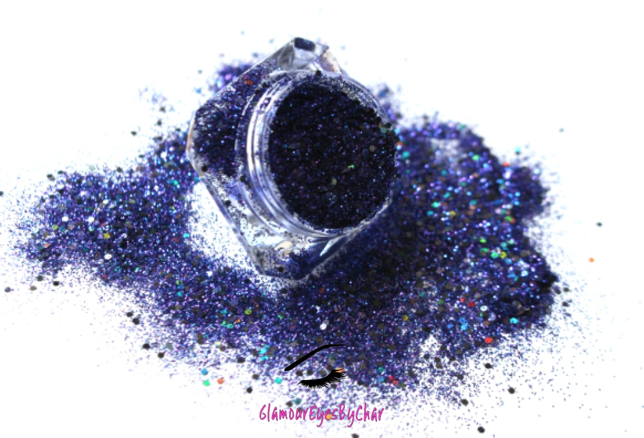 This glitter is called Purple Skies and is part of the chunky glitter collection. It consists of royal purple and a hint of navy glitter with a holographic sparkle. It’s perfect to create a sexy purple smokey eye look. Purple Skies can be used for your face, body, hair and nails. Comes in 5g jars only.