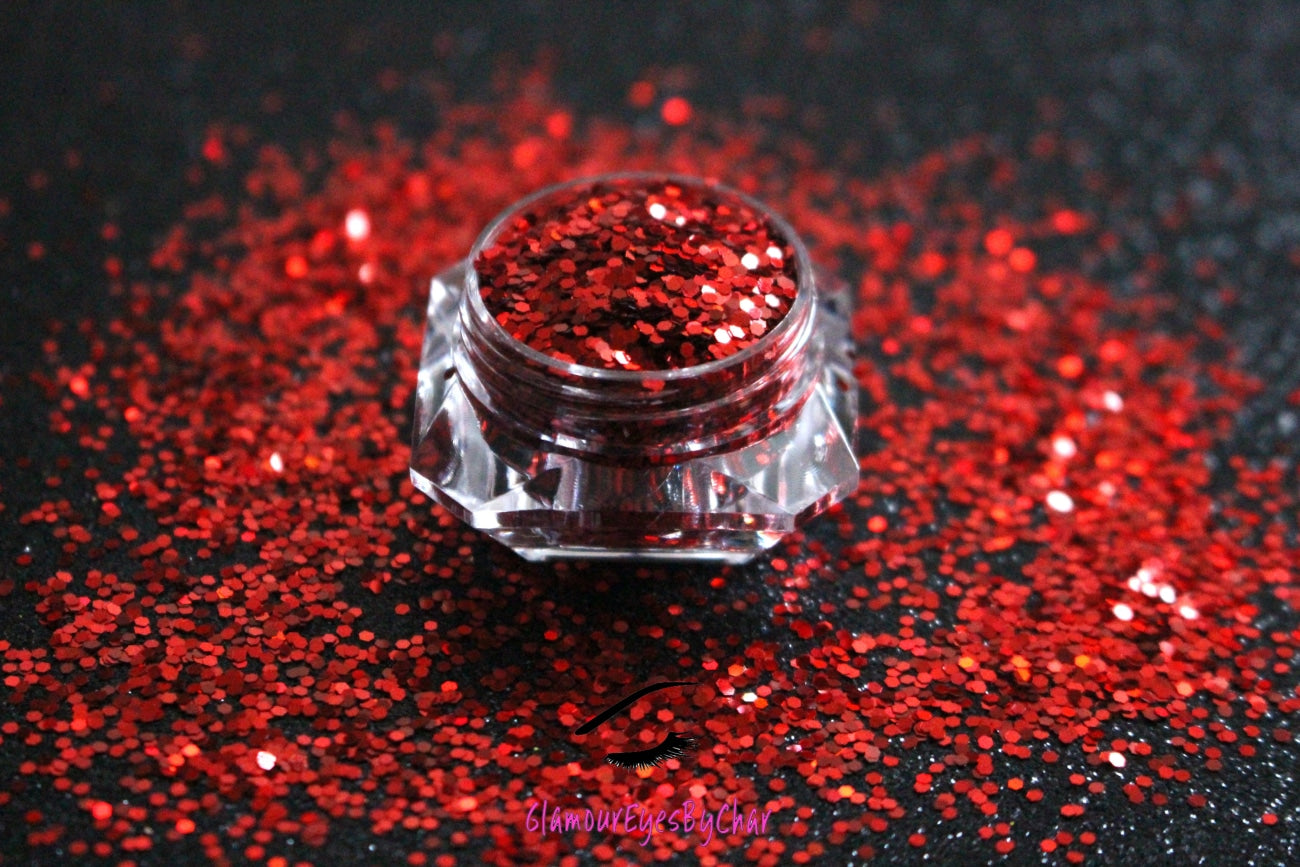 This glitter is called Red Pumps and is part of the simple glitter collection. It consists of ruby red simple glitter. Flake size are larger than fine and extra fine glitter. Red Pumps can be used for your face, body, hair and nails. Comes in 5g jars only.  