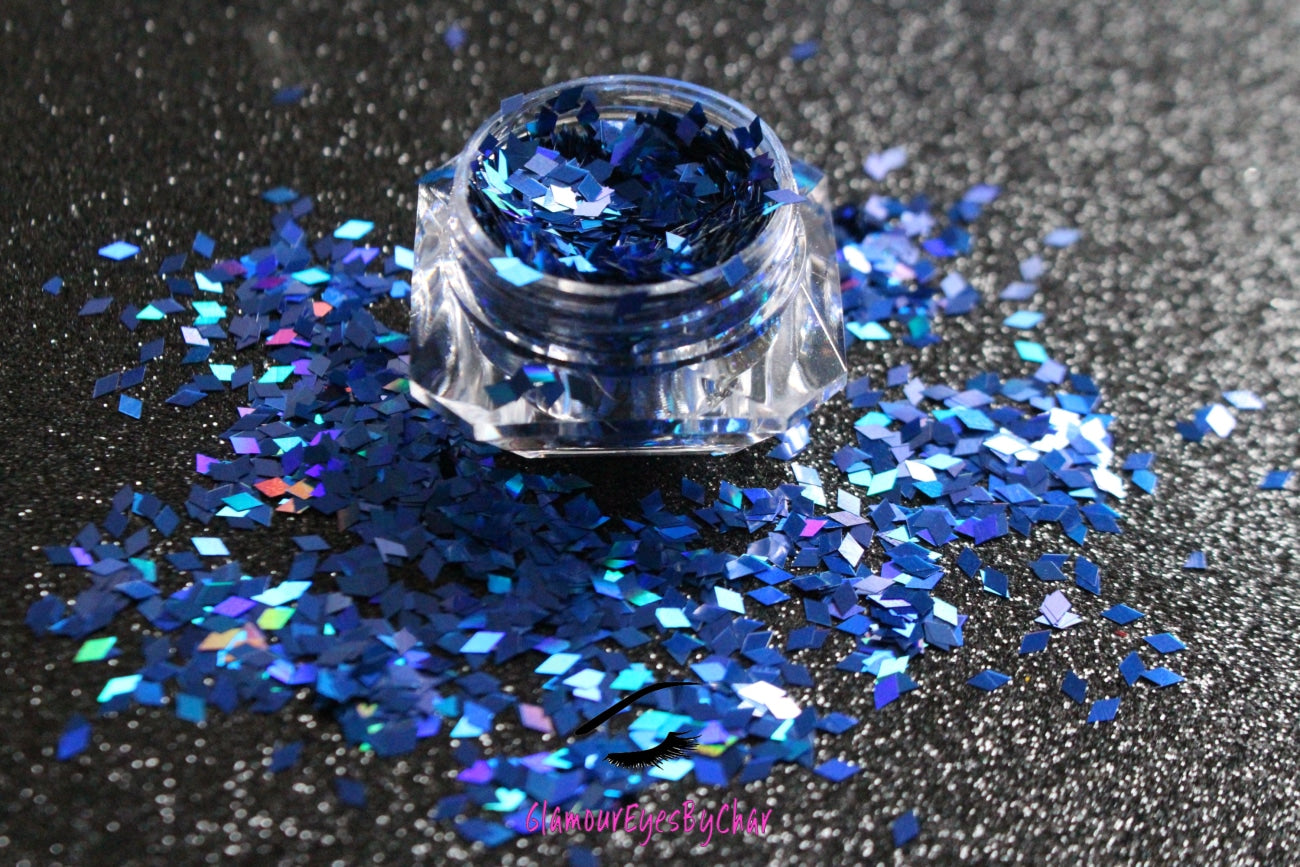 This glitter is called Royal Blue Diamonds and is part of the shaped glitters collection. It consists of royal blue diamond glitter with a holographic sparkle. Royal Blue Diamonds can be used for your face, body, hair and nails.