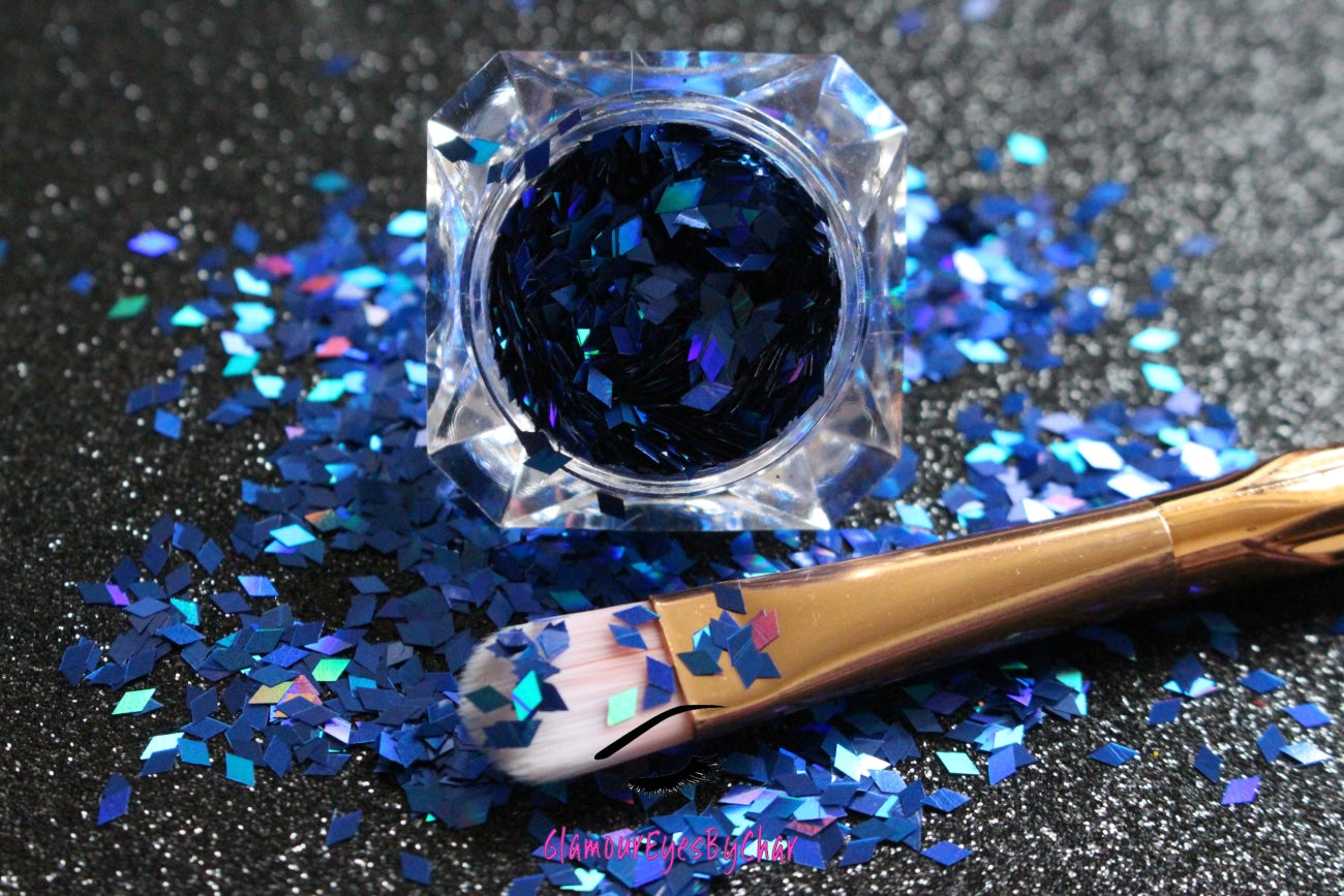 This glitter is called Royal Blue Diamonds and is part of the shaped glitters collection. It consists of royal blue diamond glitter with a holographic sparkle. Royal Blue Diamonds can be used for your face, body, hair and nails.