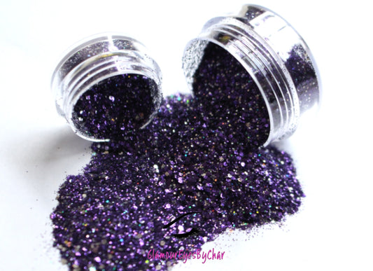 This glitter is called Royalty and is part of the chunky glitter collection. It consists of royal purple metallic glitter and has a holographic sparkle. Royalty can be used for your face, body, hair and nails. Comes in 5g and 10g jars.