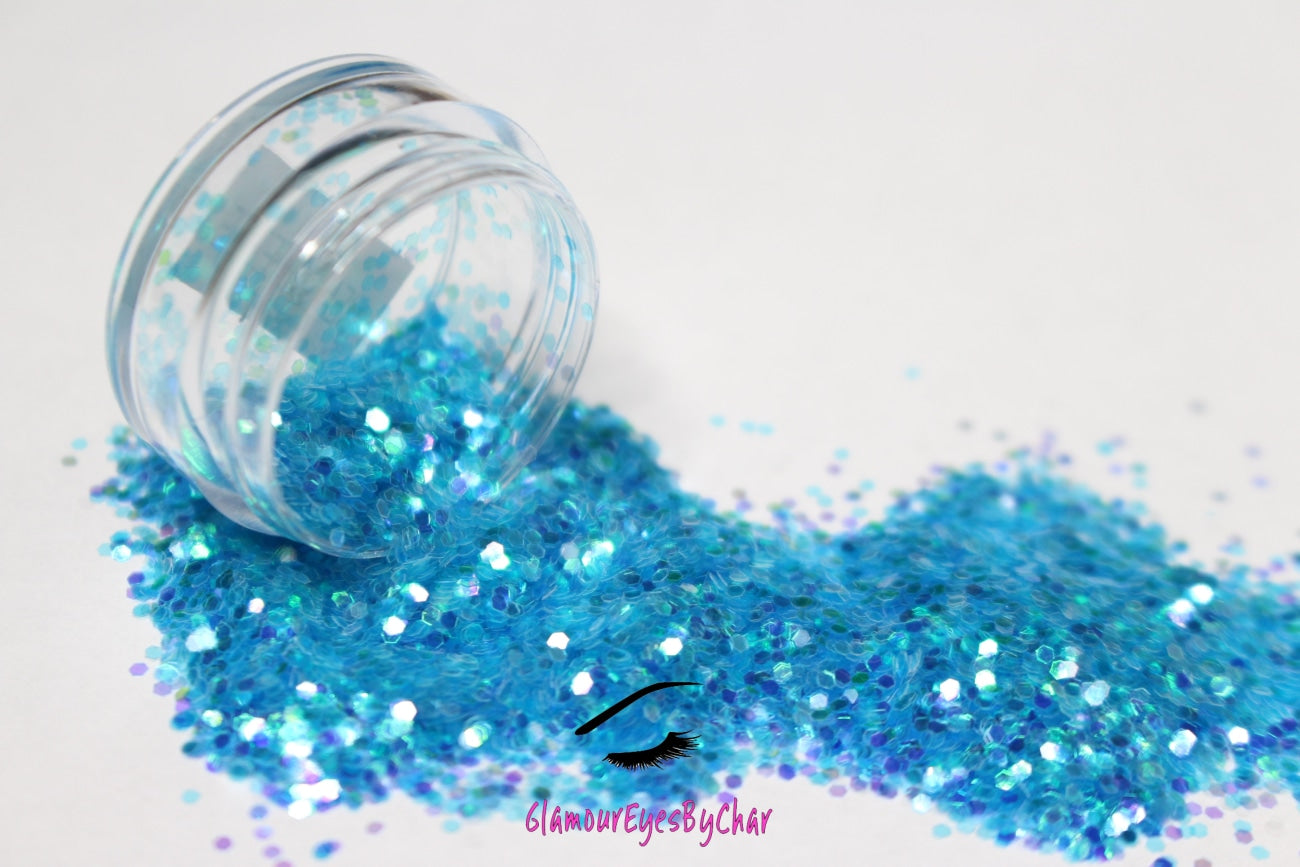 This glitter is called Sea Breeze and is part of the simple glitter collection.  It consists of aqua blue glitter with an iridescent sparkle. Flake size is larger than fine and extra fine glitter. Sea Breeze can be used for your face, body, hair and nails.  Comes in 5g jars only. **Glitter will be discontinued once sold out**
