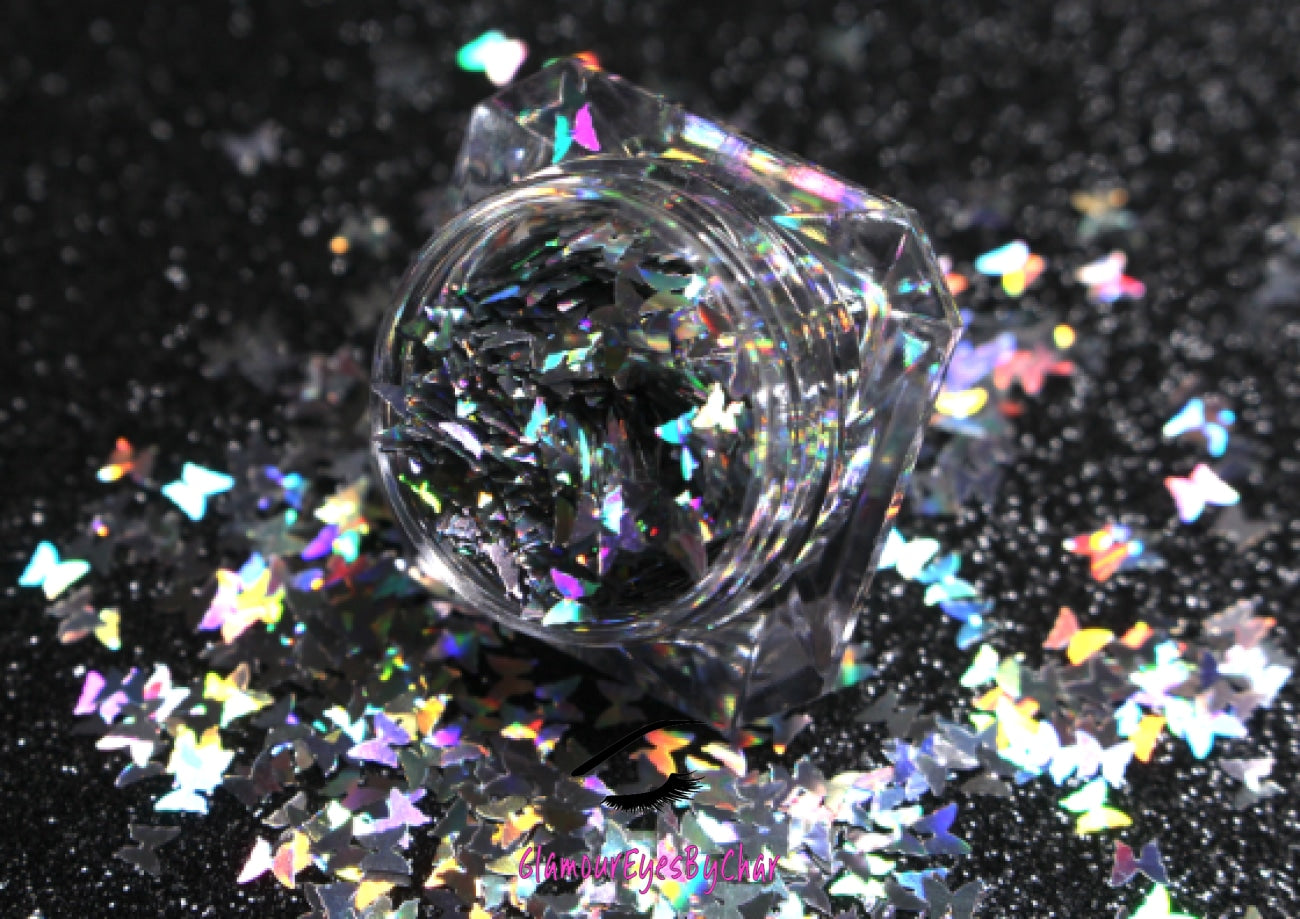 This glitter is called Silver Butterflies and is part of the shaped glitters collection. It consists of silver 3.0mm butterflies with a holographic sparkle. Silver Butterflies is