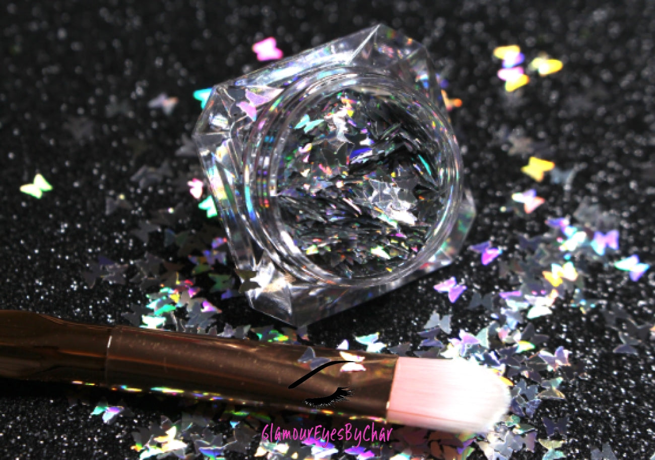 This glitter is called Silver Butterflies and is part of the shaped glitters collection. It consists of silver 3.0mm butterflies with a holographic sparkle. Silver Butterflies is