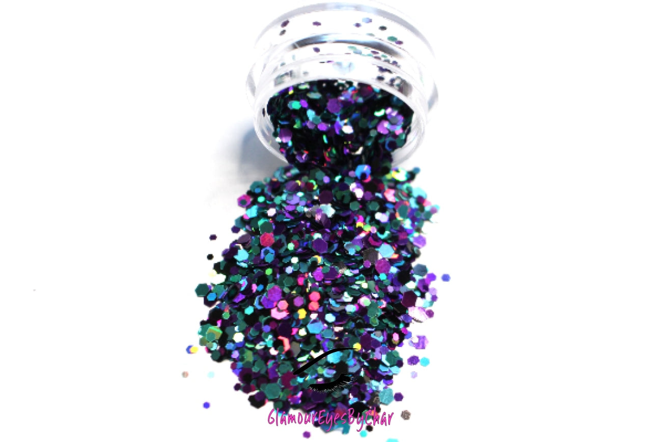 This glitter is called Spellbound and is part of the super chunky glitter collection.  It consists of royal purple and teal glitter with a holographic sparkle. Spellbound can be used for your face, body, hair and nails.  Comes in 5g jars only. **Glitter will be discontinued once sold out**