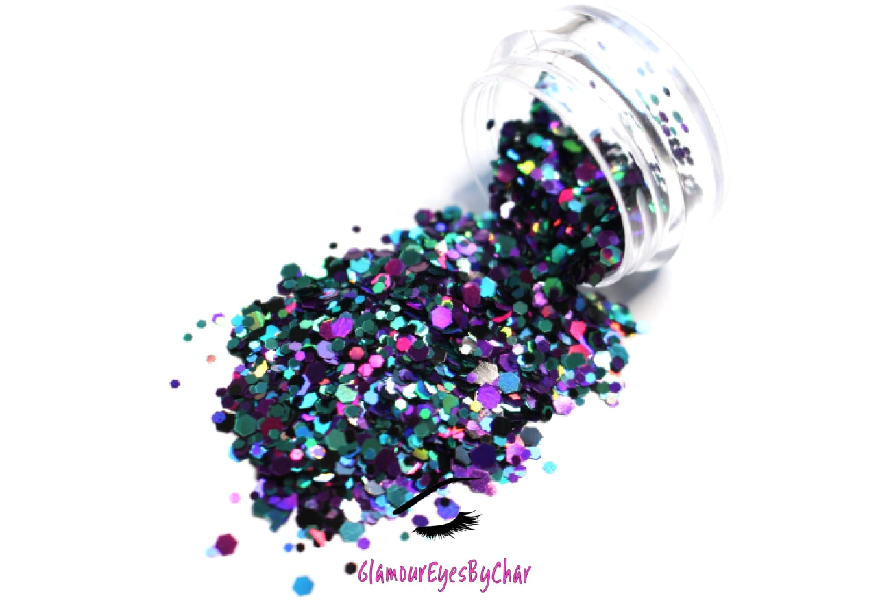 This glitter is called Spellbound and is part of the super chunky glitter collection.  It consists of royal purple and teal glitter with a holographic sparkle. Spellbound can be used for your face, body, hair and nails.  Comes in 5g jars only. **Glitter will be discontinued once sold out**