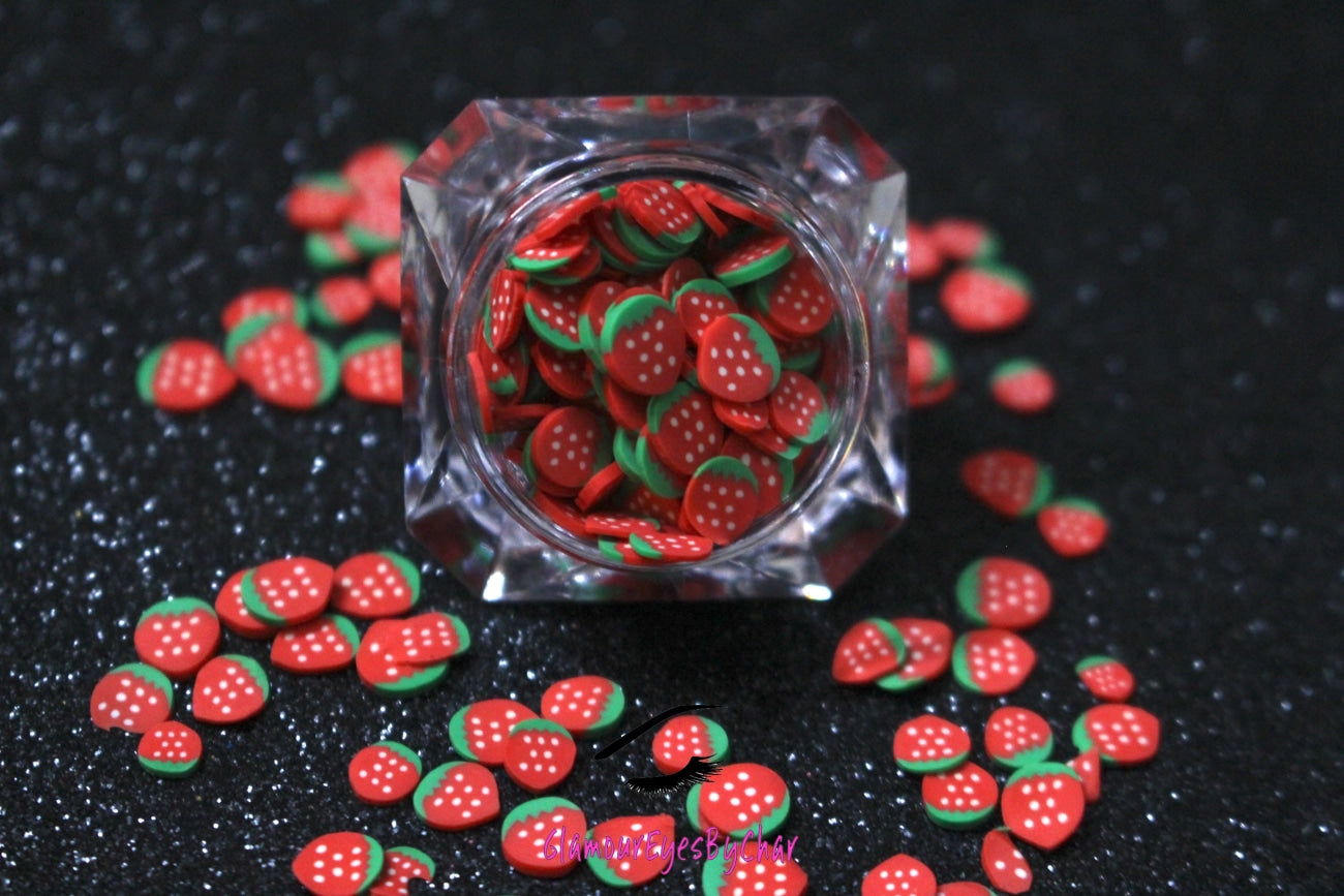 These Strawberry Fruit Slices are PERFECT for 3D nail or body art. They can also be used for a DIY craft project. The fruit slices are made of polymer clay and are approximately 3mm/0.12 inch in size. Comes in 5g jars only. Note: Strawberry Fruit Slices are not recommended for use in the immediate eye area. Tip: Apply some of our glitter to your nails to really GLAMOUREYES your look.