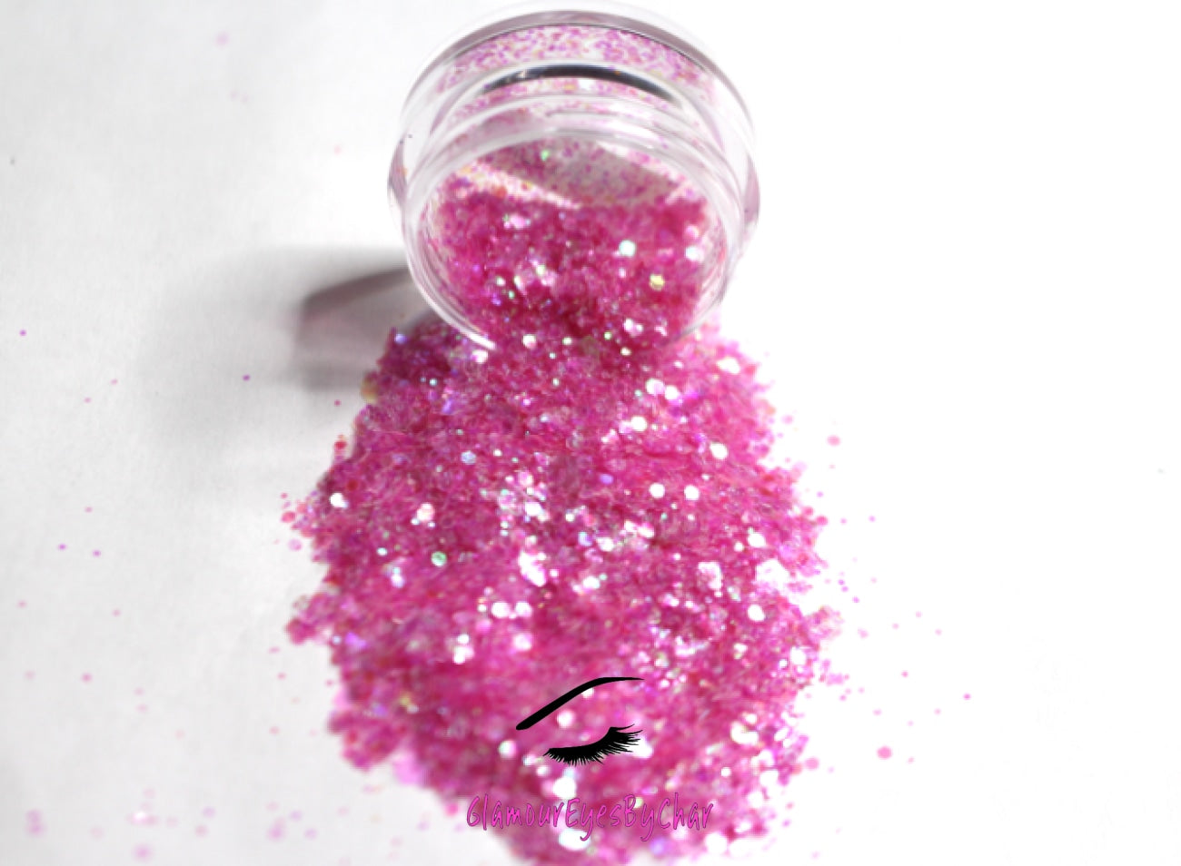 This glitter is called Sweetheart and is part of the super chunky glitter collection. It consists of pink glitter with an iridescent sparkle. Sweetheart can be used for your face, body, hair and nails. Comes in 5g and 10g jars. **Glitter will be discontinued once sold out**