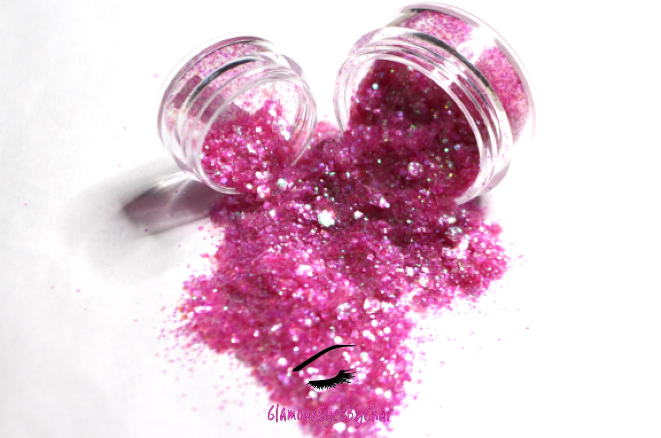This glitter is called Sweetheart and is part of the super chunky glitter collection. It consists of pink glitter with an iridescent sparkle. Sweetheart can be used for your face, body, hair and nails. Comes in 5g and 10g jars. **Glitter will be discontinued once sold out**