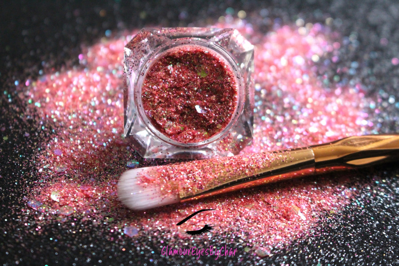 This glitter is called Tropical Sunset and is part of the super chunky glitter collection.  It consists of bright coral and fuchsia glitter with an iridescent sparkle. Tropical Sunset can be used for your face, body, hair and nails.  Comes in 5g jars only. **Glitter will be discontinued once sold out**
