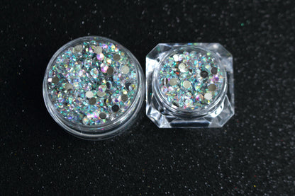 Clear AB Rhinestones – Flatback Resin (2mm &amp; 3mm)
Part of our Glamour Goodies Collection, these clear AB flatback resin rhinestones are perfect for adding extra sparkle to your nails or any creative project. With a brilliant shimmer that catches the light, they bring just the right touch of glam wherever you use them.

Stone size: 2mm and 3mm
Available in 5g and 10g jars.
Note: 10g jars are round and not diamond shaped. Rhinestones are sold by weight and not individually counted.