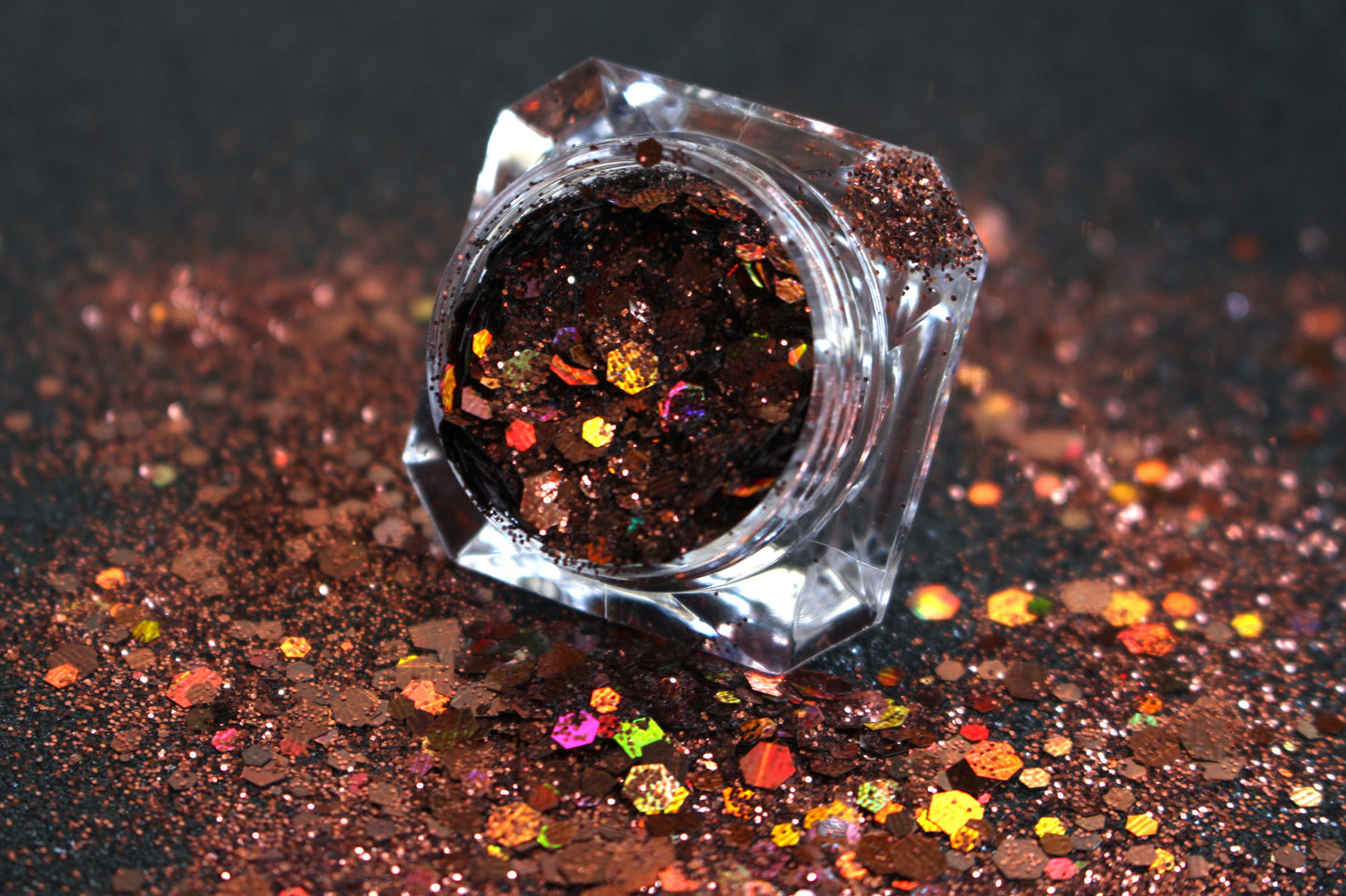 This glitter is called Brown Sugar and is part of the super chunky glitter collection.  It consists of chocolate brown holographic glitter. Brown Sugar can be used for your face, body, hair and nails.  Comes in 5g jars only.  