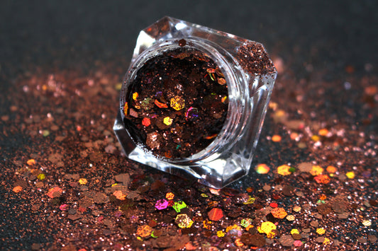This glitter is called Brown Sugar and is part of the super chunky glitter collection.  It consists of chocolate brown holographic glitter. Brown Sugar can be used for your face, body, hair and nails.  Comes in 5g jars only.  