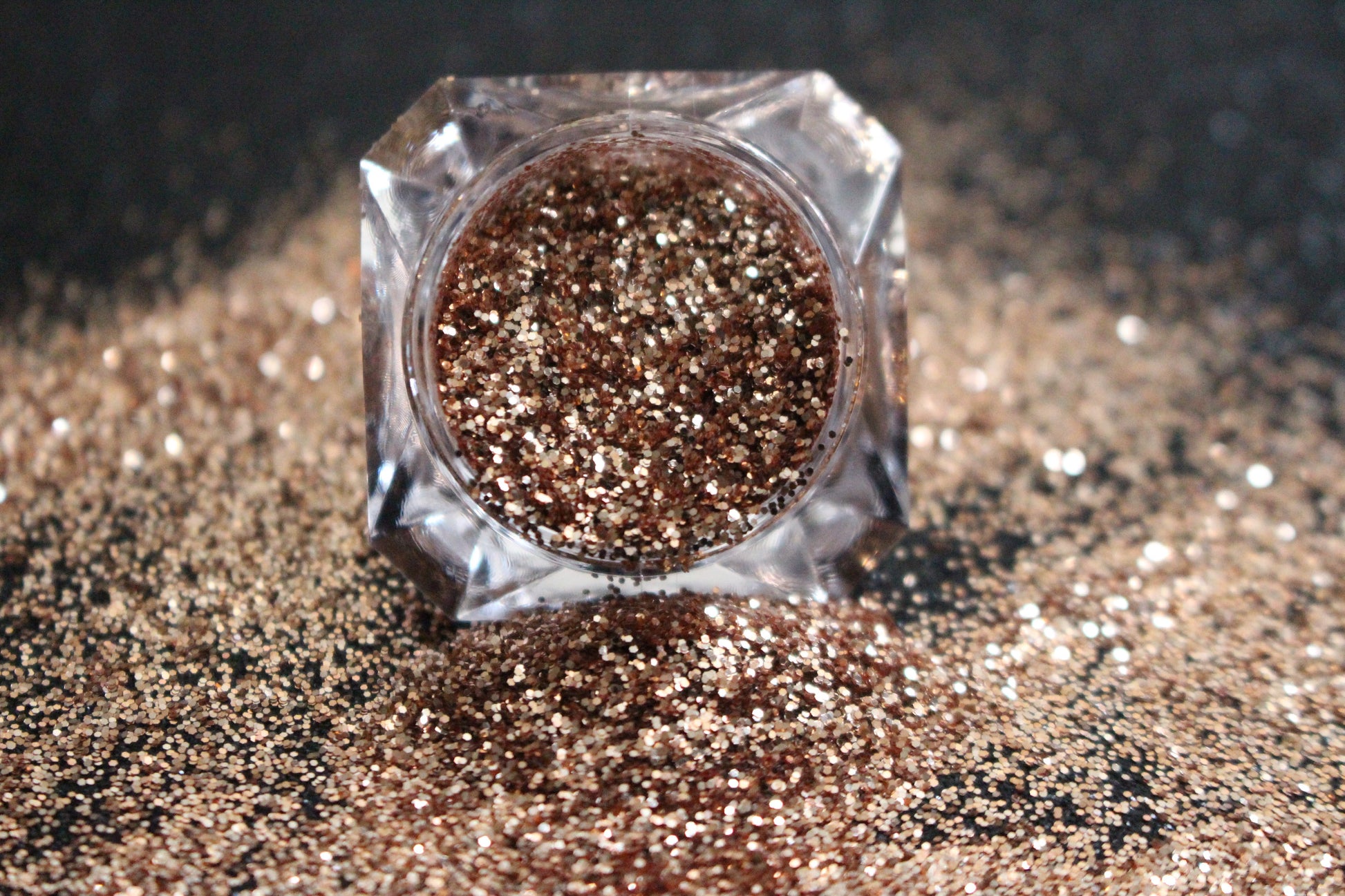 Champagne – Premium Dark Champagne Gold Glitter
Part of our Simple Glitter Collection, this fine glitter shimmers in a rich dark champagne gold tone for an effortlessly elegant touch. Champagne can be used for all your creative looks, nail art, hair, and glitter slime.
Available in 5g jars only.