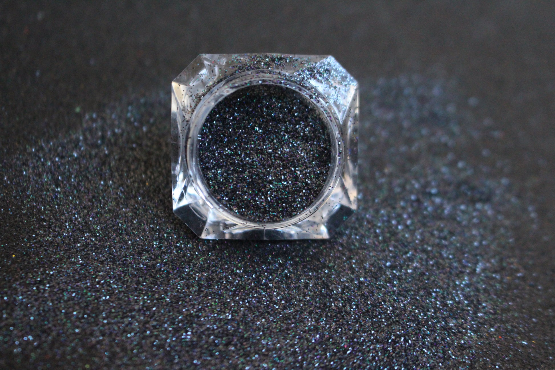 Dark Skies – Premium Holographic Black Glitter
A simple glitter from our Mini Wholesale Glitter Collection, with a bold holographic black sparkle. Dark Skies is perfect for all your creative looks, nail art, hair, glitter slime, resin art, tumblers, crafts, and DIY projects.
Available in 2oz mini wholesale only.

Note: Glitter is sold by weight of 2oz in a resealable bag.