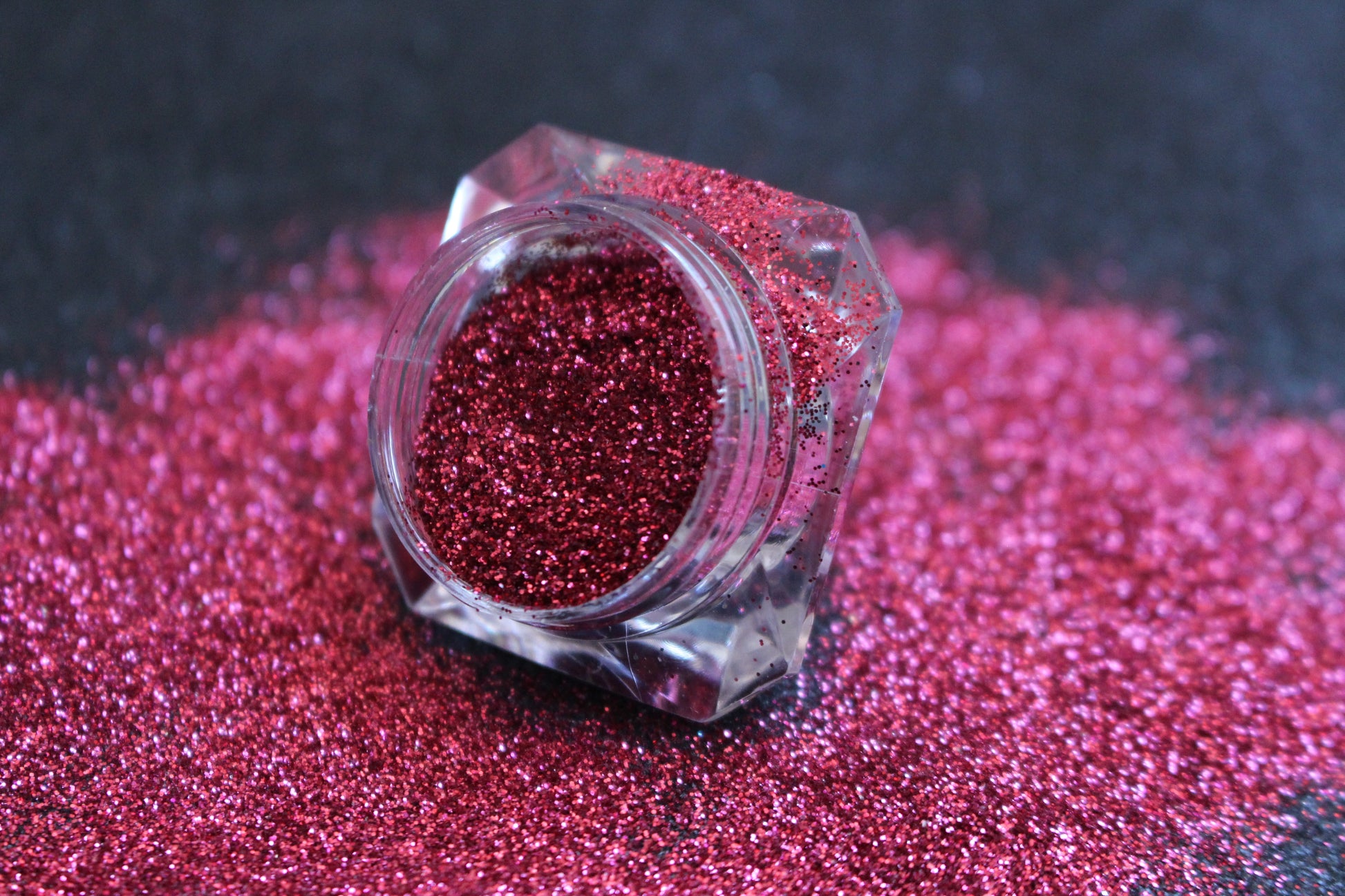 Dragon Fruit – Premium Dark Pink Glitter
Part of our Simple Glitter Collection, this rich dark pink glitter adds a juicy pop of colour to your creations. Dragon Fruit is a limited edition glitter that can be used for all your creative looks, nail art, hair, and glitter slime.
Available in 5g jars only.