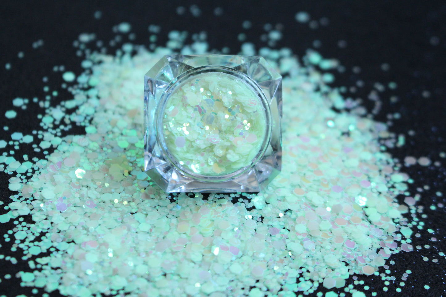 This premium glitter is part of the Glow In The Dark Glitter Collection. It consists of iridescent blue-green glitter with a vibrant green glow. Glow Getter is perfect for nail art and glitter slime. We advise against applying it to the skin. Available in 5g jars only.  Heat resistant  Note: For long-lasting luminescence, simply expose the glitter to light for a few minutes, and watch it glow for hours, adding the perfect touch to your nails.