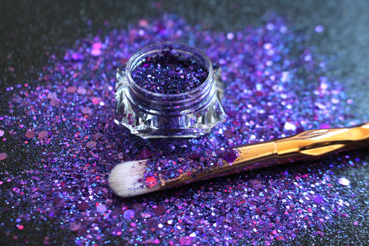 This glitter is called Love Spell and is part of the super chunky glitter collection. It consists of deep purple and violet glitter with a holographic sparkle. Love Spell can be used for your face, body, hair and nails. Comes in 5g jars only.  