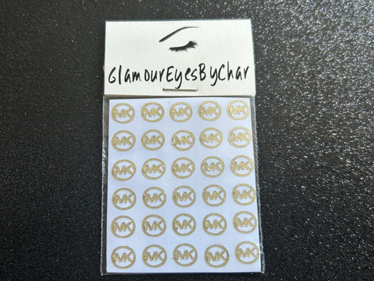 Michael Kors Inspired Nail Stickers – 30 Pieces (7 Colours)
No need to visit the nail salon—spice up your nails at home with these stylish Michael Kors designer-inspired nail stickers. Perfect for natural or acrylic nails, you can apply them over regular polish, gel, or shellac. These handmade stickers also work beautifully for body art and DIY crafts.
