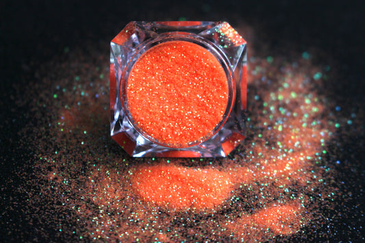 Orange Crush – Premium Iridescent Neon Orange Glitter
Part of our Simple Glitter Collection, this vibrant iridescent neon orange glitter shines with playful orange and green sparkle. Orange Crush can be used for all your creative looks, nail art, hair, and glitter slime.
Available in 5g jars only.
