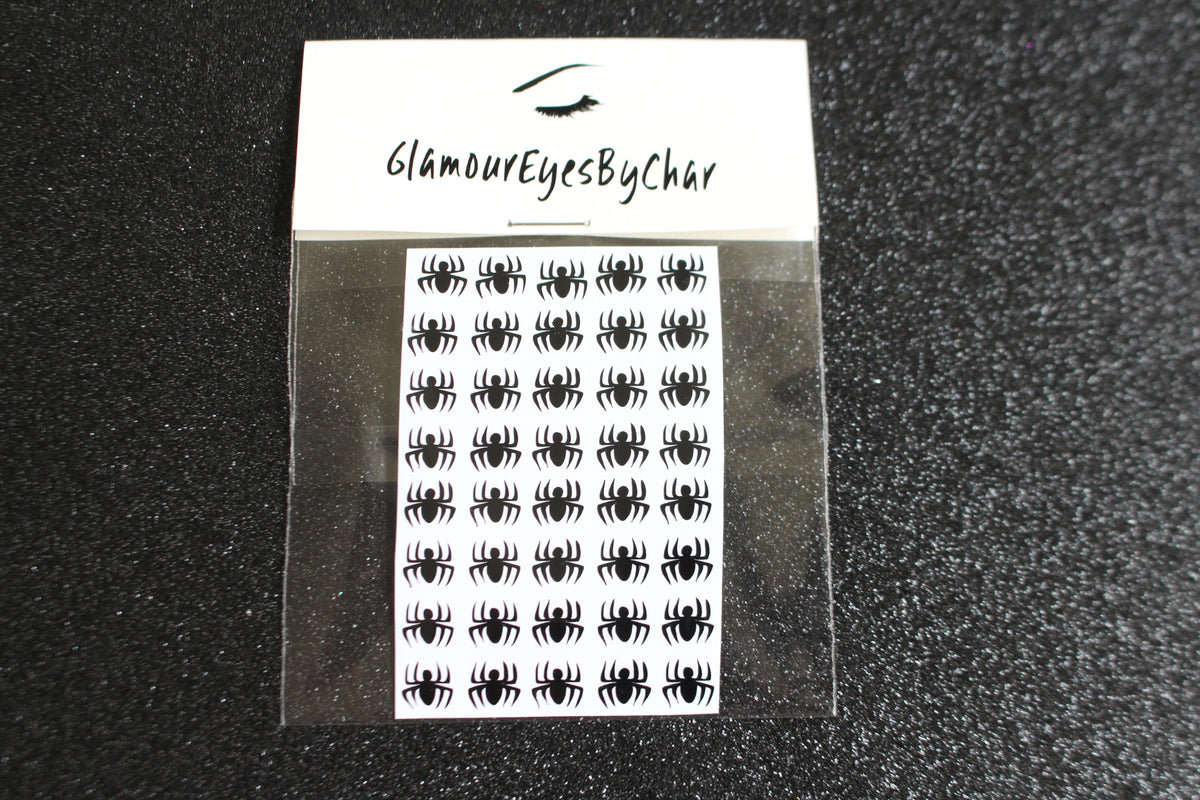 Spider Halloween Nail Stickers – 40 Pieces
Part of our Halloween Collection, these creepy-cute spider nail stickers are the perfect way to get spooky without a trip to the salon. Apply them to natural or acrylic nails, or layer over regular polish, gel, or shellac for an instant Halloween vibe.

Each pack includes 40 stickers — just right for nail art 💅🏾 or fun DIY projects 🕷️.

🌟 Glam Tip:&nbsp;Apply some of our glitter on your nails to really&nbsp;GLAMOUREYES&nbsp;your look.