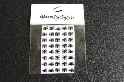 Spider Halloween Nail Stickers – 40 Pieces
Part of our Halloween Collection, these creepy-cute spider nail stickers are the perfect way to get spooky without a trip to the salon. Apply them to natural or acrylic nails, or layer over regular polish, gel, or shellac for an instant Halloween vibe.

Each pack includes 40 stickers — just right for nail art 💅🏾 or fun DIY projects 🕷️.

🌟 Glam Tip:&nbsp;Apply some of our glitter on your nails to really&nbsp;GLAMOUREYES&nbsp;your look.