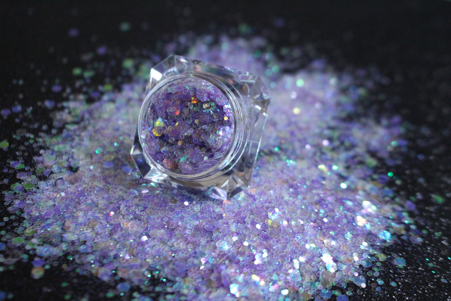 This premium glitter is part of the Super Chunky Glitter Collection. It consists of iridescent lilac glitter. Sweet Dreams can be used for your face, hair, body, nail art and glitter slime. Available in 5g jars only. 