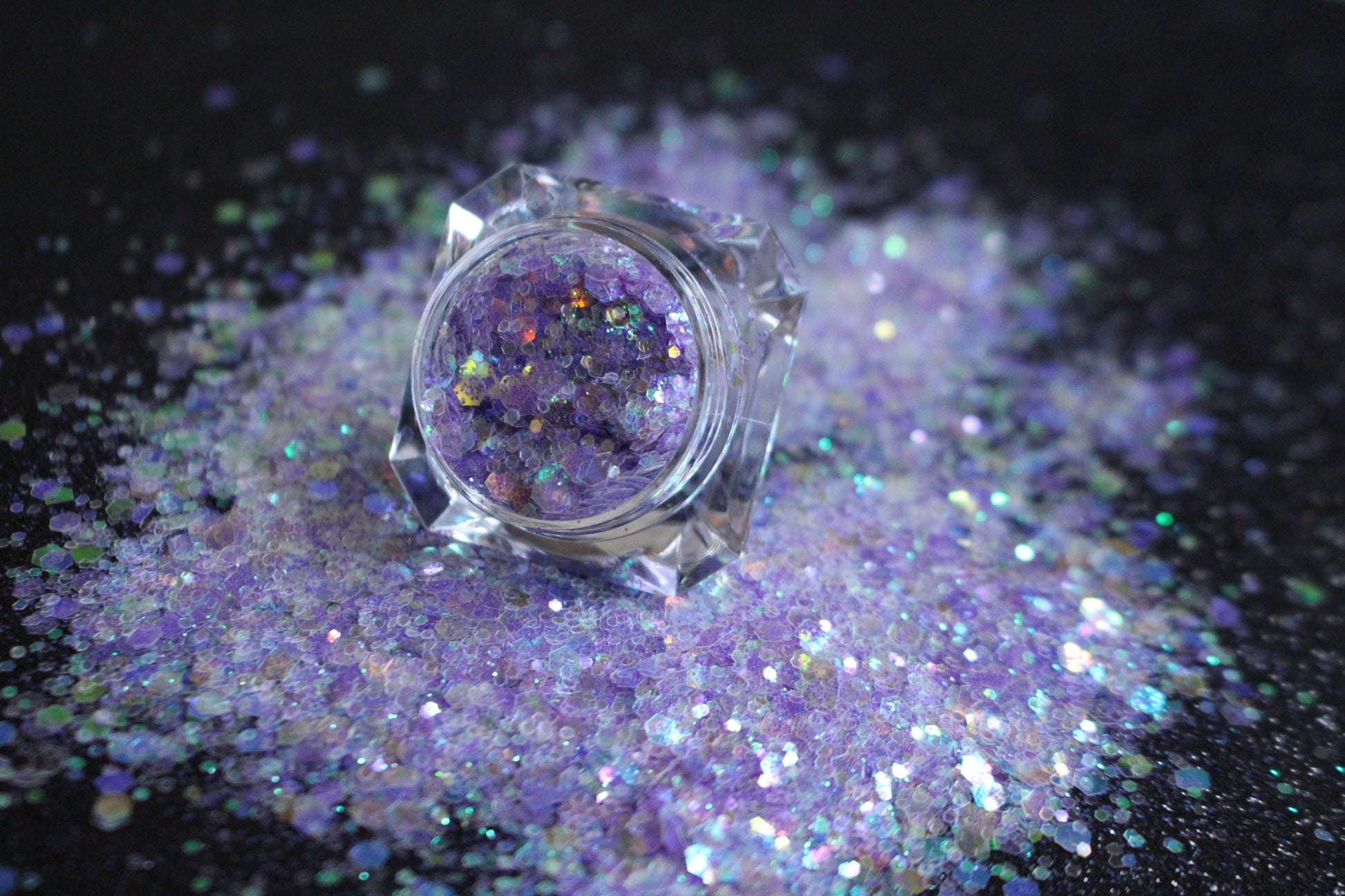 This premium glitter is part of the Super Chunky Glitter Collection. It consists of iridescent lilac glitter. Sweet Dreams can be used for your face, hair, body, nail art and glitter slime. Available in 5g jars only. 