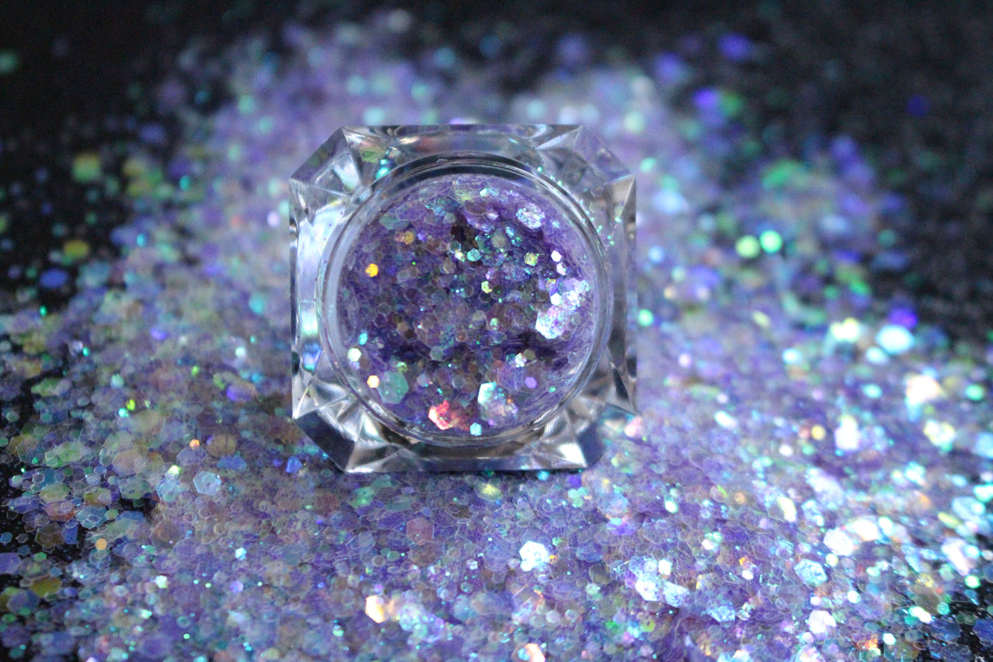 This premium glitter is part of the Super Chunky Glitter Collection. It consists of iridescent lilac glitter. Sweet Dreams can be used for your face, hair, body, nail art and glitter slime. Available in 5g jars only. 