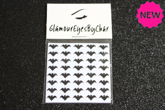 It's spooky season 🎃👻 No need to go to the nail salon to get ready for Halloween. You can do your spooky nails at home with these unique bat nail decals. They can be used on natural or acrylic nails. You can also apply them on top of regular or gel/shellac nail polish. These handmade decals can also be used for body art or any DIY project. Each pack contains 40 decals.  Tip: Apply some of our glitter on your nails to really GLAMOUREYES your look.