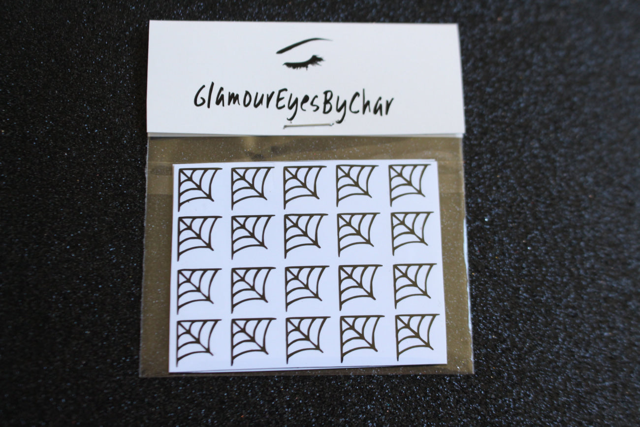 Cobweb Nail Stickers – 40 Pieces (2 Sheets)
Part of our Halloween Collection, these creepy-cute cobweb nail stickers are the perfect way to get festive without heading to the salon. Apply them to natural or acrylic nails, or layer over polish, gel, or shellac for an instant spooky vibe. Handmade with care, they’re also fun for crafts and DIY projects.

Each pack includes 40 stickers (2 sheets of 20) — just right for hauntingly cute nail art 💅🏾 or spooky DIY fun 🕸️