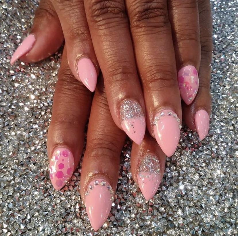 This glitter is called Candy Shop and is part of the super chunky glitter collection.  It consists of fuchsia glitter with an iridescent sparkle. Candy Shop can be used for your face, body, hair and nails.  Comes in 5g jars only.