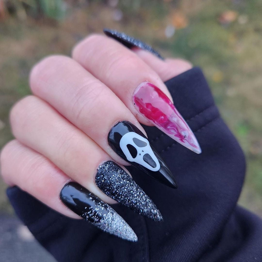 Ghostface Inspired Nail Stickers – 40 Pieces (2 Sheets)
Part of our Halloween Collection, the screams are getting louder this spooky season 🎃👻. Skip the salon and slash your nail game at home with these eerie Ghostface inspired nail stickers. Perfect for natural or acrylic nails, they’re easy to apply over regular polish, gel, or shellac. Handmade with care, these stickers bring serious horror vibes to your Halloween look — and are also fun for creepy crafts or DIY projects.

Each pack includes 40 sticker