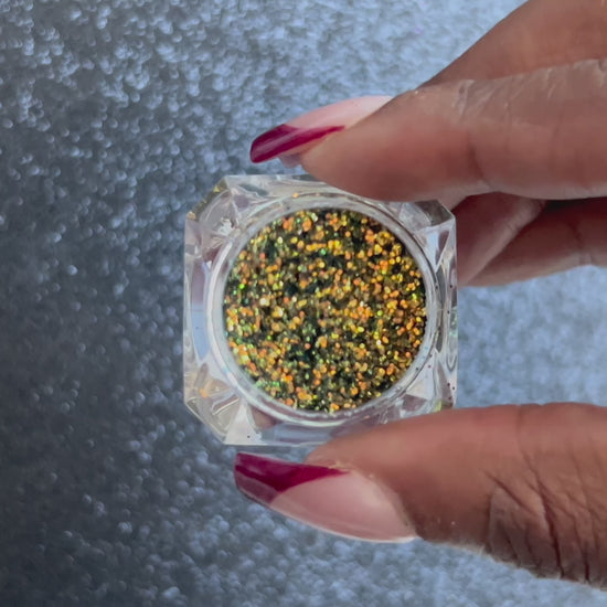 Beautiful Nightmare – Premium Olive Green and Gold Glitter
Part of our Simple Glitter Collection, this premium glitter features olive green tones with rich golden reflections that give off a dramatic, edgy vibe. Beautiful Nightmare can be used for all your creative looks, nail art, hair, and glitter slime.
Available in 5g jars only.