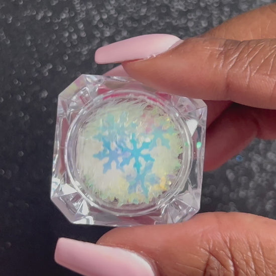 Snowflakes – Premium 9mm Iridescent Glitter Shapes
Part of our Holiday Collection, these delicate 9mm snowflakes shimmer in two enchanting iridescent colours. Perfect for adding a touch of cozy winter magic to nail art and glitter slime.
Available in 5g jars only.