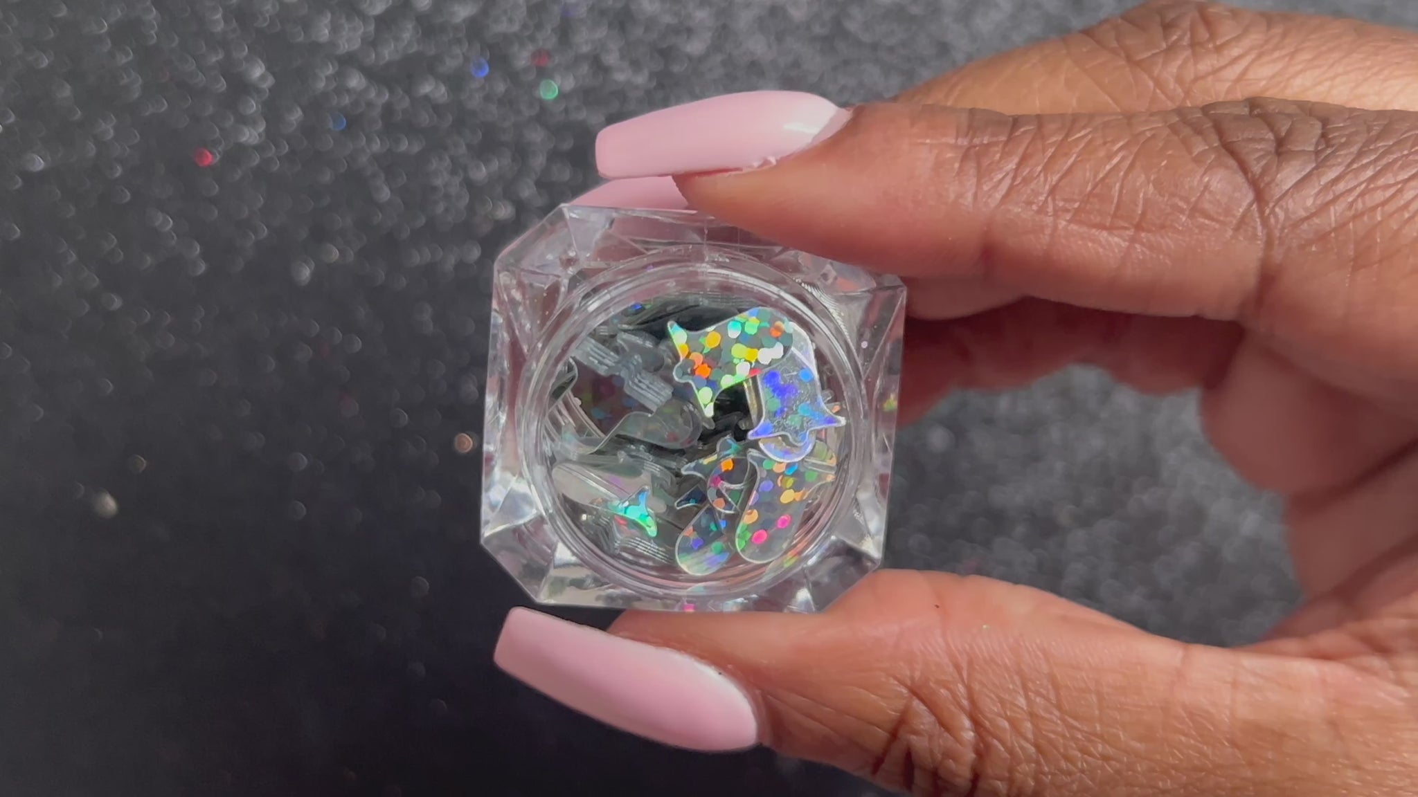 Silver Bells – Premium 10mm Holographic Glitter Shapes
Part of our Holiday Collection, these shimmering 10mm silver bells add a joyful sparkle to nail art and glitter slime.
Available in 5g jars only.