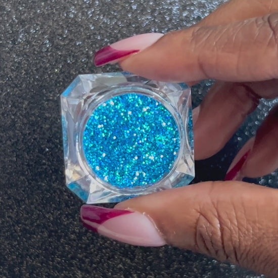 Poolside – Premium Holographic Caribbean Sea Blue Glitter
Part of our Simple Glitter Collection, this glitter shines with holographic Caribbean sea blue sparkle. Poolside is perfect for all your creative looks, nail art, hair, and glitter slime.
Available in 5g jars only.