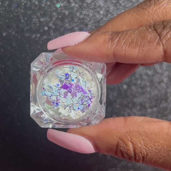 North Pole – Premium Iridescent Holiday Glitter Mix with Snowflakes and Trees
This premium glitter is part of the Holiday Collection. It consists of white, silver, light pink, purple, and blue glitter, mixed with iridescent Christmas trees and snowflakes. North Pole is&nbsp;perfect for nail art and glitter slime.
Available in 5g jars only.