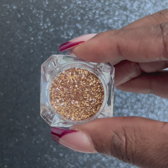 Champagne – Premium Dark Champagne Gold Glitter
Part of our Simple Glitter Collection, this fine glitter shimmers in a rich dark champagne gold tone for an effortlessly elegant touch. Champagne can be used for all your creative looks, nail art, hair, and glitter slime.
Available in 5g jars only.