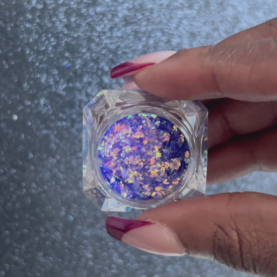 Grapetini – Premium Iridescent Purple Cellophane Glitter Flakes
Part of our Cellophane Glitter Flakes Collection, these iridescent purple glitter shards shimmer with green and golden reflects. Grapetini is&nbsp;perfect for nail art and glitter slime.
Available in 5g jars only.
