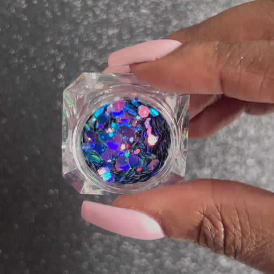 Hypnotic – Premium Dark Pink Glitter Mix with Purple and Teal Colour-Shifting Sparkle
A chameleon premium glitter from our Super Chunky Glitter Collection, featuring dark pink glitter with a unique purple and teal colour-shifting sparkle. Hypnotic&nbsp;is perfect&nbsp;
for all your creative looks, nail art, hair, and glitter slime.
Available in 5g jars only.