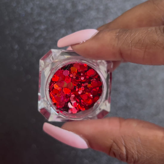 Santa Baby – Premium Holographic Ruby Red Glitter Mix
A premium glitter from our Super Chunky Glitter Collection, Santa Baby features holographic ruby red glitter with a bold, eye-catching sparkle. Perfect for all your creative looks, nail art, hair, glitter slime, resin art, tumblers, crafts, and DIY projects.
Available in 5g jars and 2oz mini wholesale.
Note: Mini wholesale glitter sold by weight of 2oz in a resealable bag.