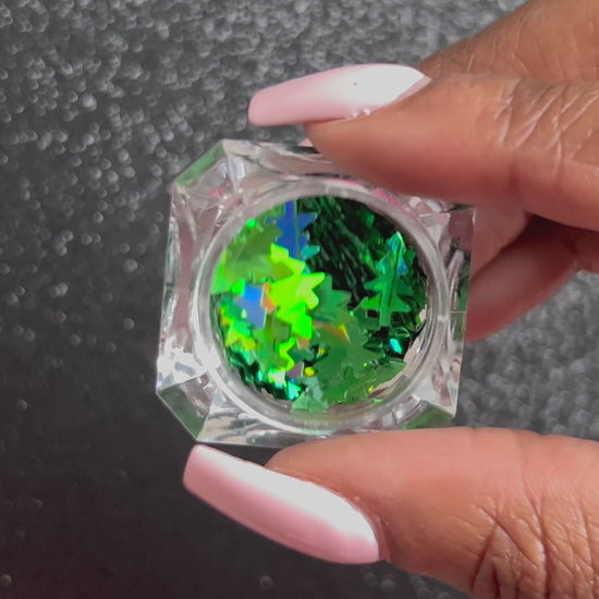 Christmas Trees – Premium 8mm Holographic Green Glitter Shapes
Part of our Holiday Collection, these festive 8mm green Christmas trees add cheerful sparkle to nail art and glitter slime.
Available in 5g jars only.