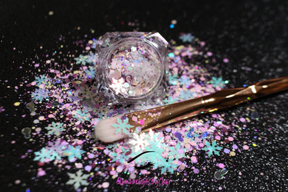 Snow Angels – Premium Light Iridescent Pink and Blue Snowflake Glitter Mix
Part of our Holiday Collection, this glitter consists of light iridescent pink and blue snowflakes with white, purple, and silver glitter. Snow Angels is perfect&nbsp;
for nail art and glitter slime.
Available in 5g jars only.