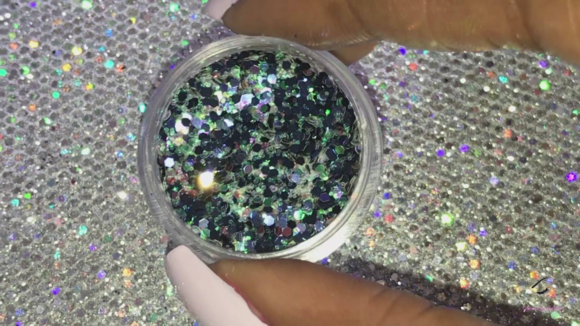 This glitter is called Mermaid Delight and is part of the chunky glitter collection.  It consists of navy blue glitter with a white iridescent sparkle. Mermaid Delight can be used for your face, body, hair and nails.  Comes in 5g jars only. ﻿**Glitter will be discontinued once sold out**